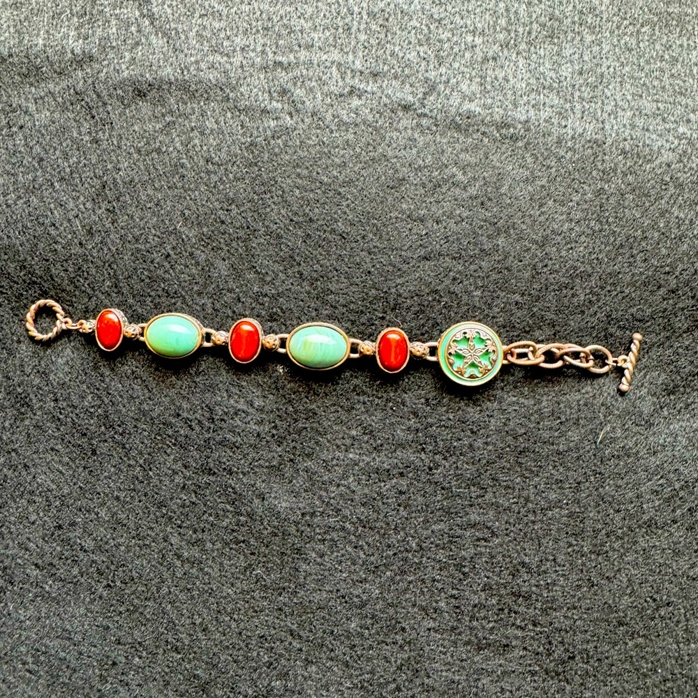 Copper toned beaded bracelet.